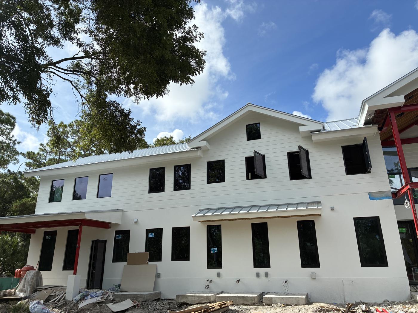 Completed modern farmhouse estate with full exterior stucco system by Quilco Stucco in Jupiter Farms, Florida