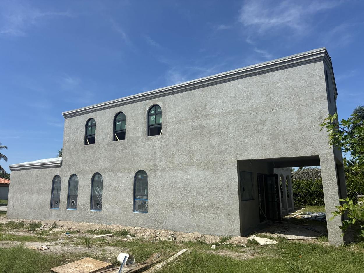 Two-Story Exterior — completed exterior stucco by Quilco Stucco, West Palm Beach, FL