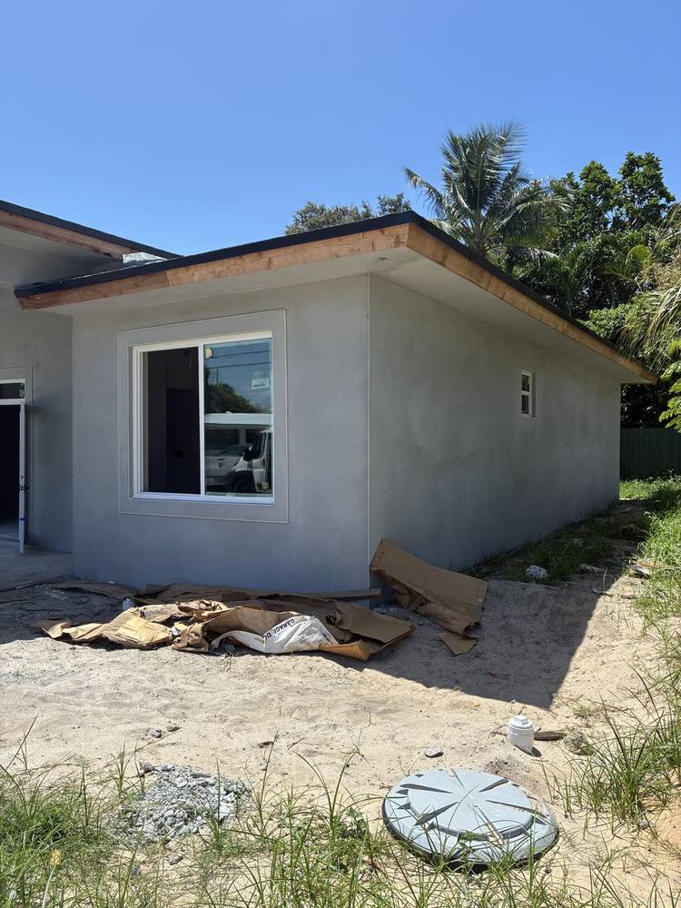 Before — bare stucco finish, Side Elevation & Window Detail, Prosperity Farms
