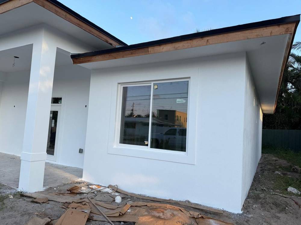 After — finished painted exterior by Quilco Stucco, Side Elevation & Window Detail, Prosperity Farms